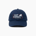 Navy blue baseball cap with white and orange "Cait Conley Congress" logo and New York state outline embroidery.